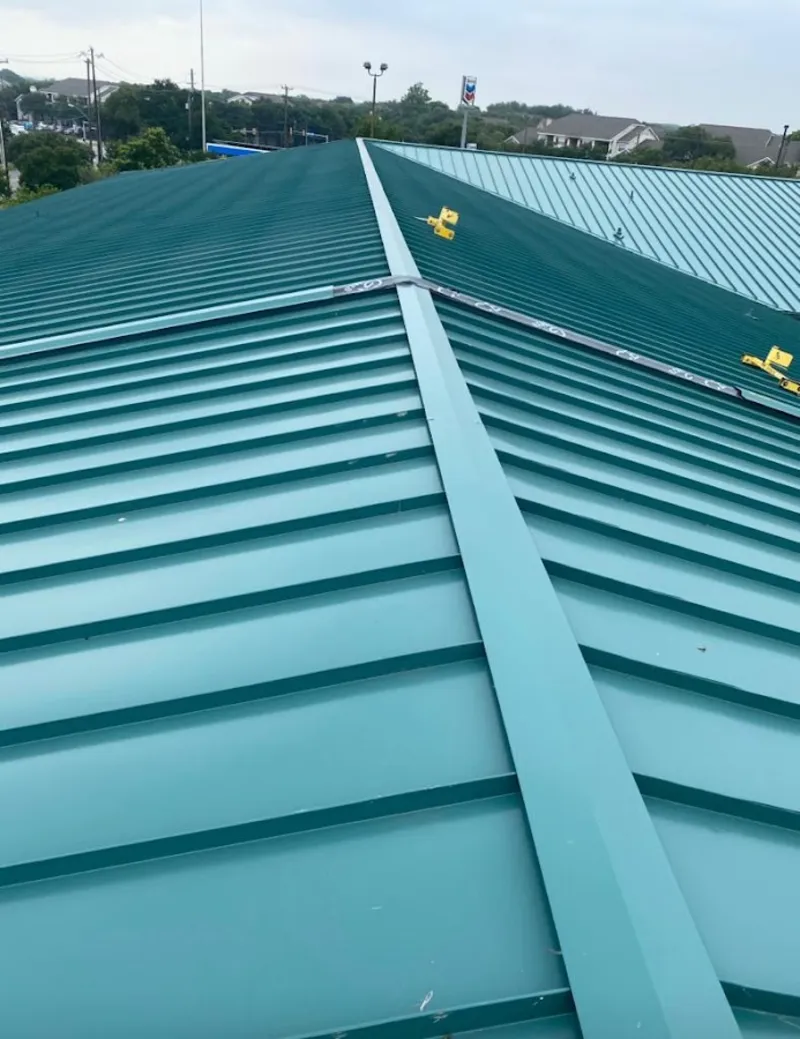 Green commercial metal roof ridge and valley for Metal Roof Repair in Parker